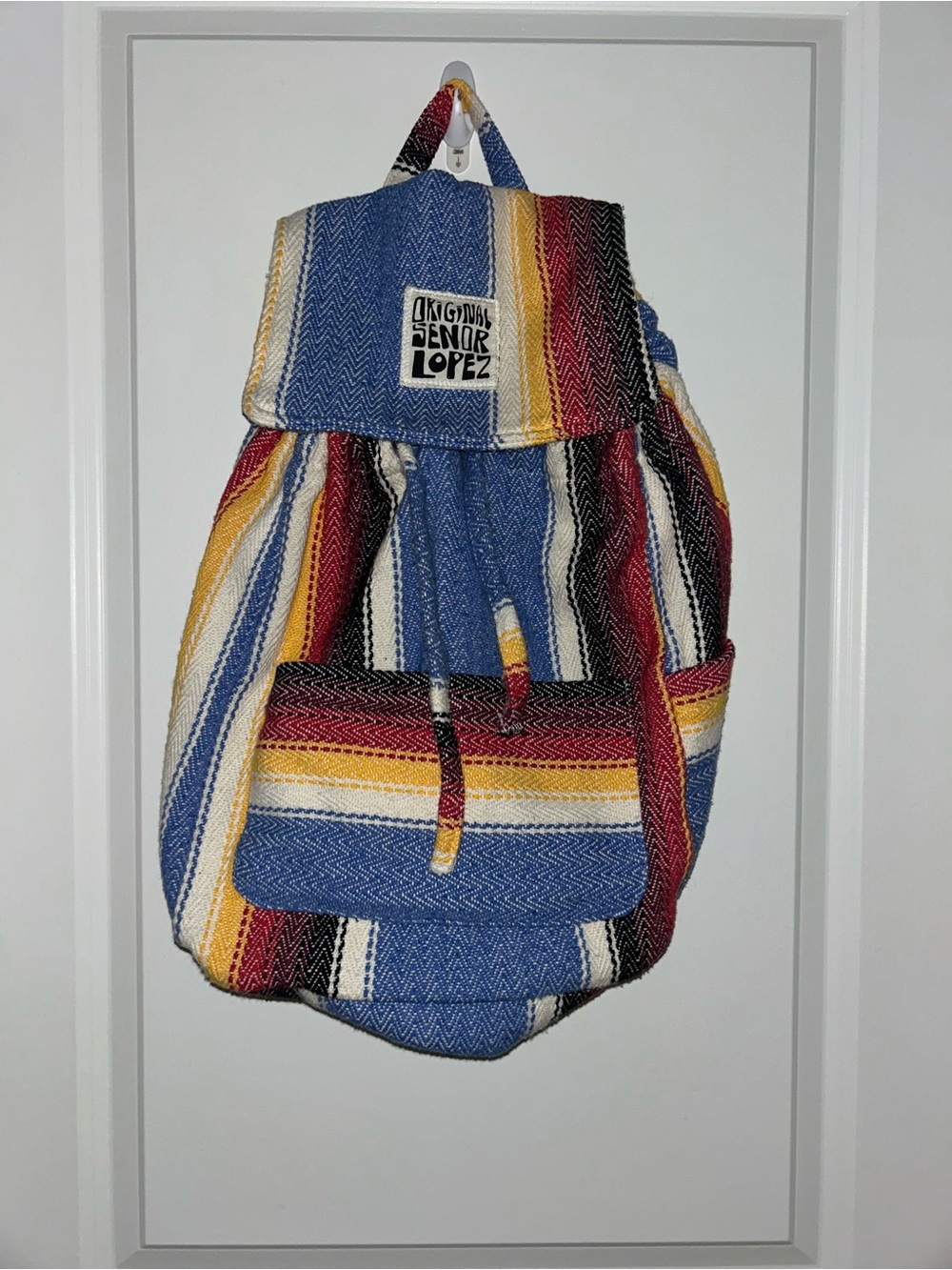 Sendra Blue, Yellow, Red Striped Woven Backpack